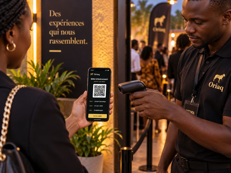 Un billet affiché sur un téléphone est scanné à l'entrée d'un événement